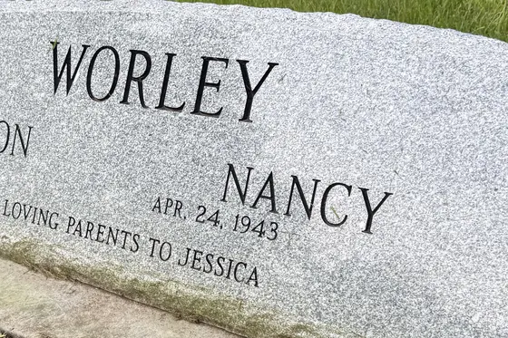 Light Grey granite on a companion slant marker with black-filled lettering
