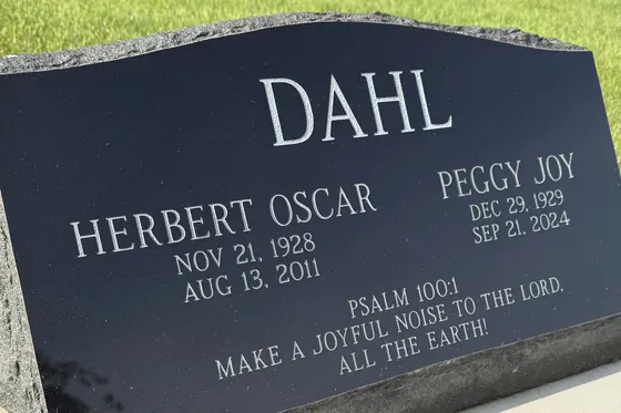 Premium Black granite on a polished companion slant marker